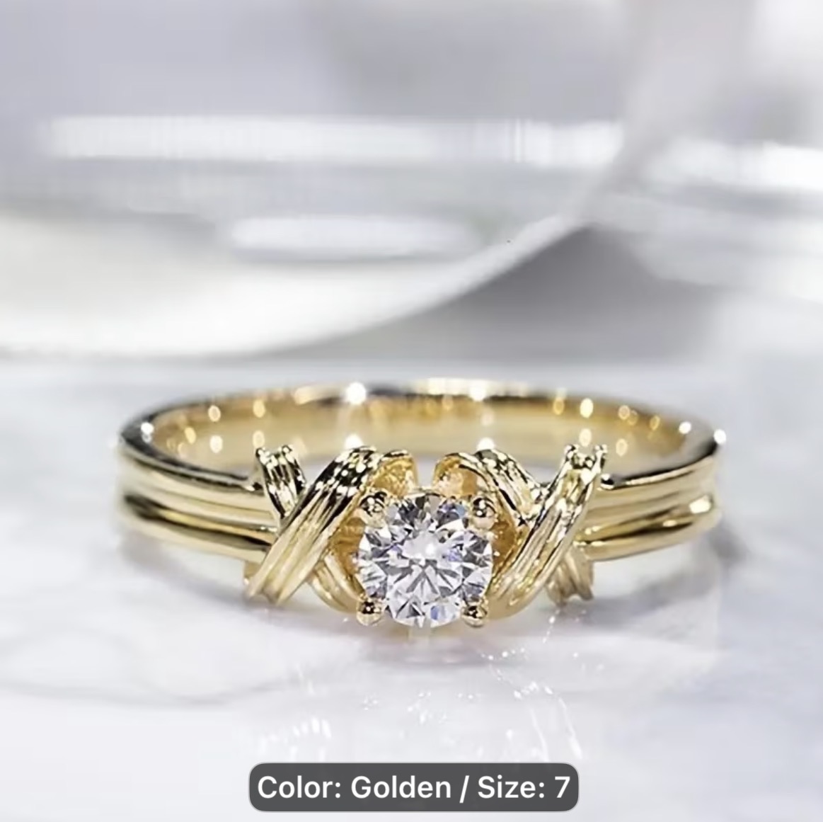 Gold “X” Wrap Solitaire Ring